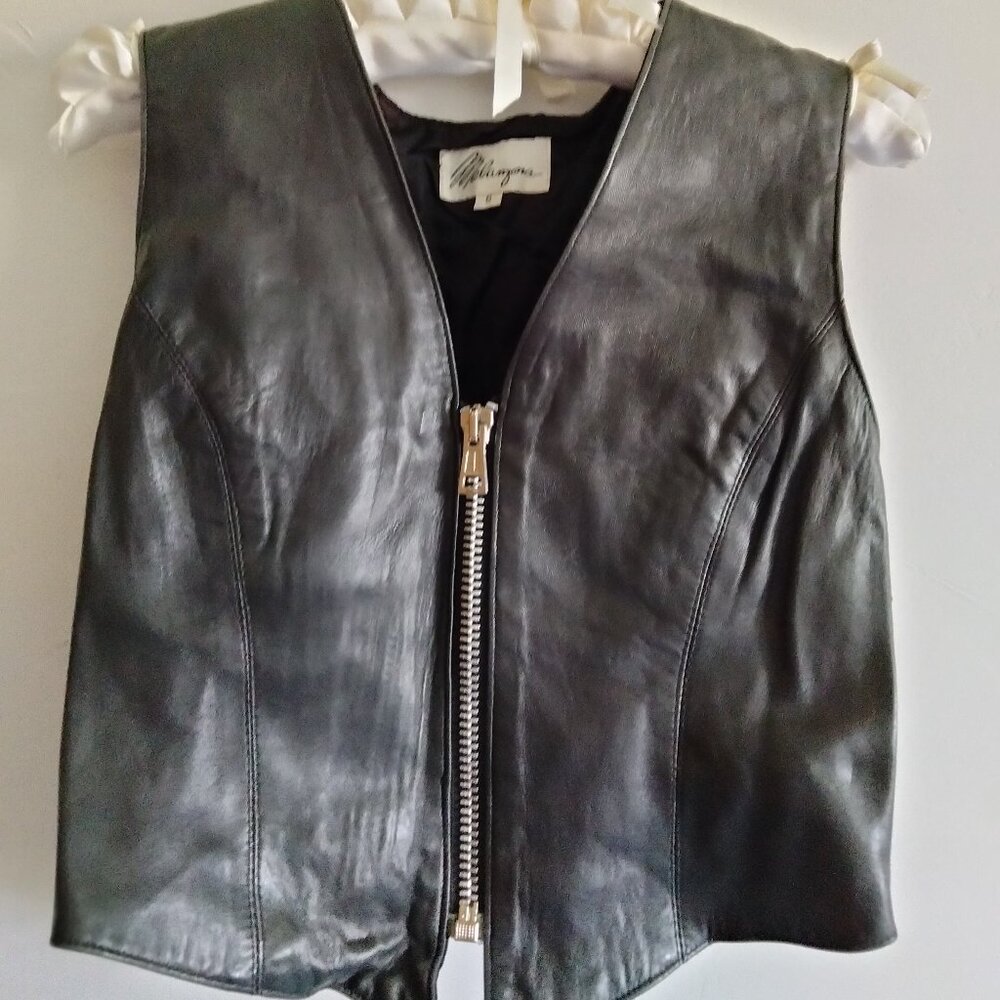 Leather riding vest with attached backpack